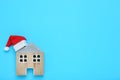 House model with red santa hat Royalty Free Stock Photo