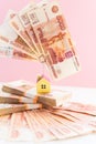 House model set on banknote for concept investment mortgage fund finance and home loan.Small wooden house on the Royalty Free Stock Photo