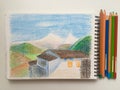 House and mountains on a white background with pencils, Himalaya sketchbook