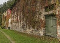 House near river Vltava and Divci Kamen ruin of castle in autumn Royalty Free Stock Photo