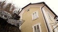 House near a rock face in Salzburg, winter time