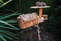 House nest for birds handmade at home, placed in a garden