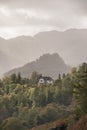 House nestling in woods above Derwentwater in Cumbria