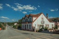 House next to a road passing through countryside Royalty Free Stock Photo