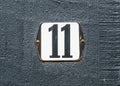 House Number 11 Black number on white plate