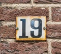 House Number 19 black on white Royalty Free Stock Photo