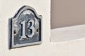 House number 13 on concrete wall. Royalty Free Stock Photo