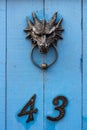 House number 43 with a dragon head door knocker