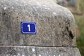 House number 1 enamelled street number plate in france home facade Royalty Free Stock Photo