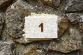 House Number 1 engraved in stone Royalty Free Stock Photo