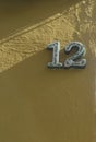 House number 12. Glazed decorated numbers Royalty Free Stock Photo