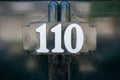 house number 110 Royalty Free Stock Photo