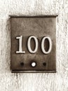 house number 100 on mailbox Royalty Free Stock Photo