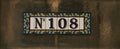 House number one hundred and eight sign