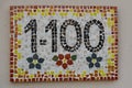 House number one thousand one hundred 1100, handmade mosaic tiles Royalty Free Stock Photo