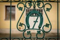 House number seven on a green iron gate