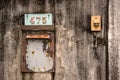 House number signs and old wall bell Royalty Free Stock Photo