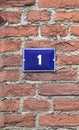 House number sone 1 white on blue