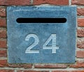 House number 24 in stone Royalty Free Stock Photo