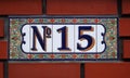 House number tile plaque with floral ornament Royalty Free Stock Photo