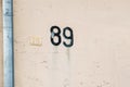 House number 89 on the wall