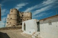 House with old plaster wall and Castle at Evoramonte Royalty Free Stock Photo