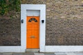 House with orange door Royalty Free Stock Photo