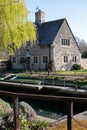 House overlooking the water at Iffley Lock in the picturesque village of Iffley on the River Thames in Oxfordshire, UK Royalty Free Stock Photo