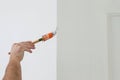 House painter at work with brush and paint. Craftsman at work in the Netherlands Royalty Free Stock Photo