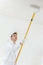 House painter at work with painting roller Royalty Free Stock Photo