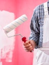 House painter worker with work tools. Construction site Royalty Free Stock Photo