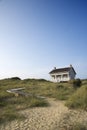 House with path to beach. Royalty Free Stock Photo