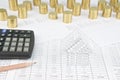 House with pencil and calculator have gold coins as background Royalty Free Stock Photo