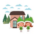 House with pine trees and couple of elves