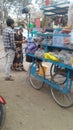 House of plastic domestic goods on hand cart