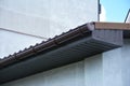 House plastic roof gutter with soffit and fascia board