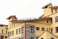 The house with plastic windows and a roof of corrugated sheet. Roofing of metal profile wavy shape on the house with plastic windo Royalty Free Stock Photo