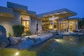 House With Pool In Backyard At Dusk Royalty Free Stock Photo