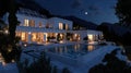 a house with a pool and a patio at night Royalty Free Stock Photo