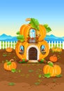 Pumpkin house stands on a pumpkin field