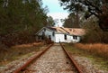 House on railroad tracks