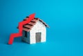 House and red arrow up. Royalty Free Stock Photo