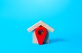 House and red location pin icon. Concept of finding a home to buy or rent. House moving company. Search for housing options.