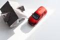 House, red miniature car and money Royalty Free Stock Photo