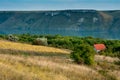 House with red roof on the slopes of the Dniester. The flooded village of Bakota. Ukrainian landscapes Royalty Free Stock Photo