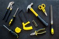 House renovation with implements set for building, painting and repair black table background top view pattern Royalty Free Stock Photo