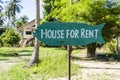 House for rent real estate sign in front of tropical house in island Koh Phangan, Thailand Royalty Free Stock Photo