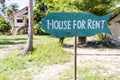 House for rent real estate sign in front of tropical house in island Koh Phangan, Thailand Royalty Free Stock Photo