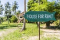 House for rent real estate sign in front of tropical house in island Koh Phangan, Thailand Royalty Free Stock Photo