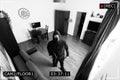 House robbery - burglar captured on surveillance security camera in room